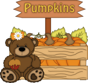 an autumn bear with pumpkins
